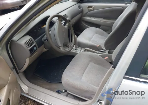 2001 Chevrolet Prizm из США, поврежденный, VIN 1Y1SK52841Z448303